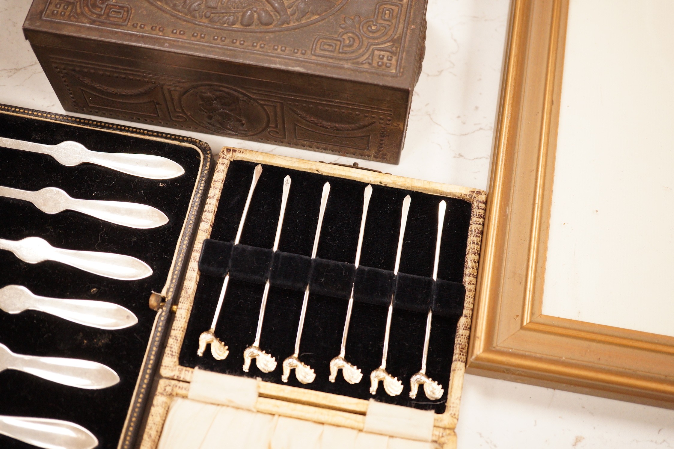 A postal scale, cased silver lobster picks, silver cocktail sticks etc